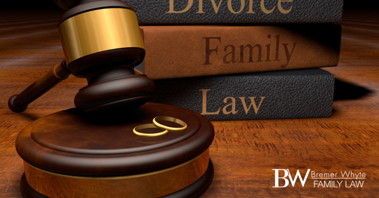 image of gavel, wedding rings and Family law legal books