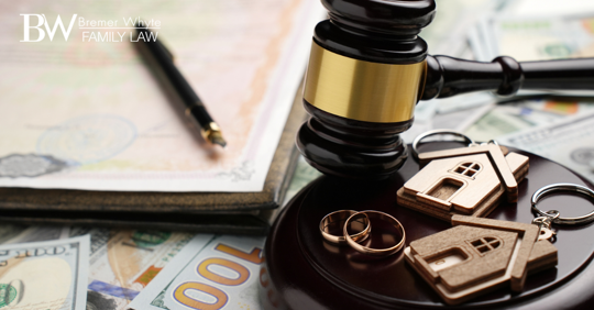 Image of gavel, wedding rings, house keys....