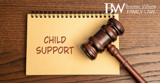 Image of gavel and 'child support' on a notebook