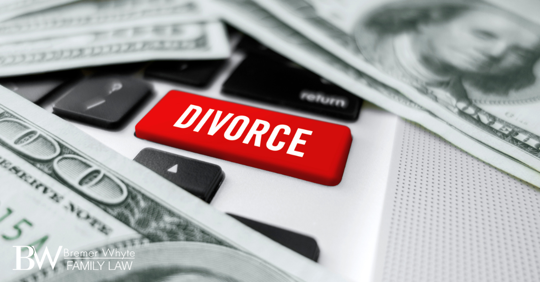 Divorce image, with a pile of dollar bills